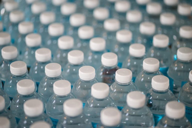 plastic bottles with white caps