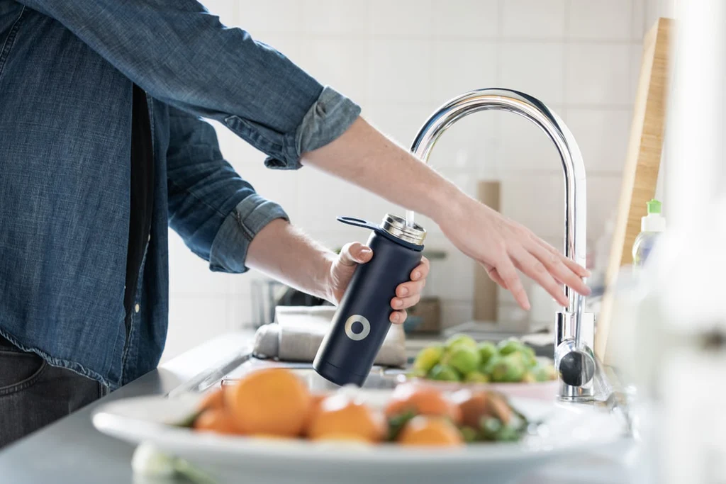 filling bottle of water