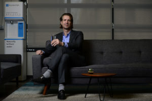 rich razgaitis flowater sitting on couch