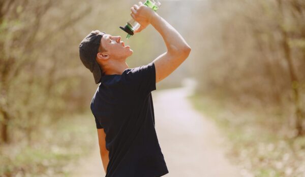 man drinking water