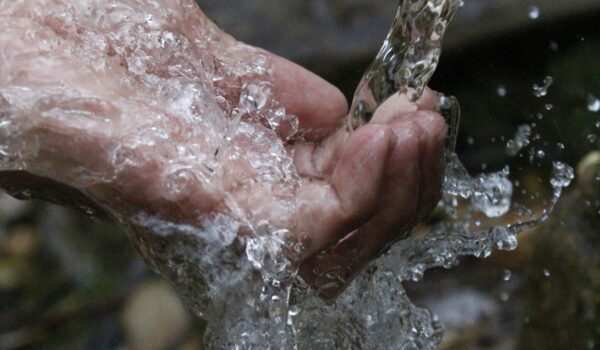 hand with running water