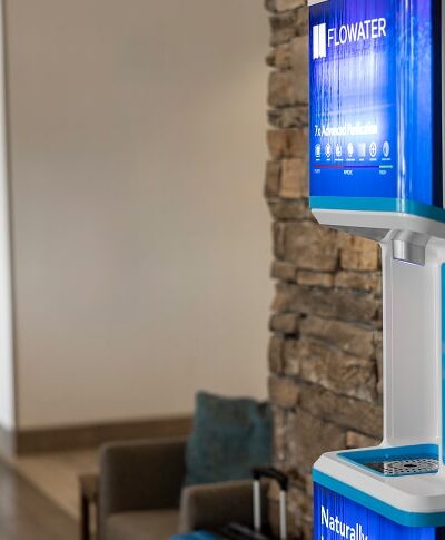 FloWater refill station near brick wall