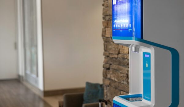 FloWater refill station near brick wall