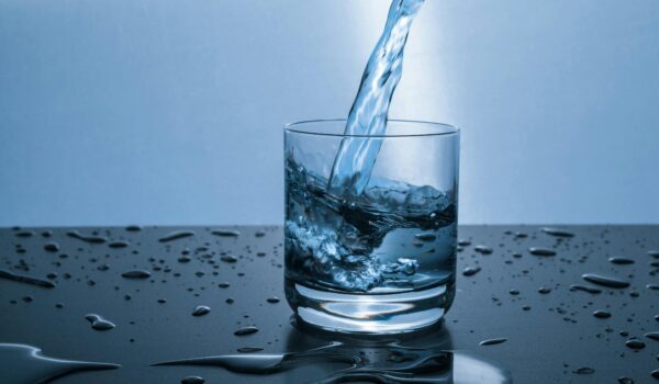 drinking water being poured into cup