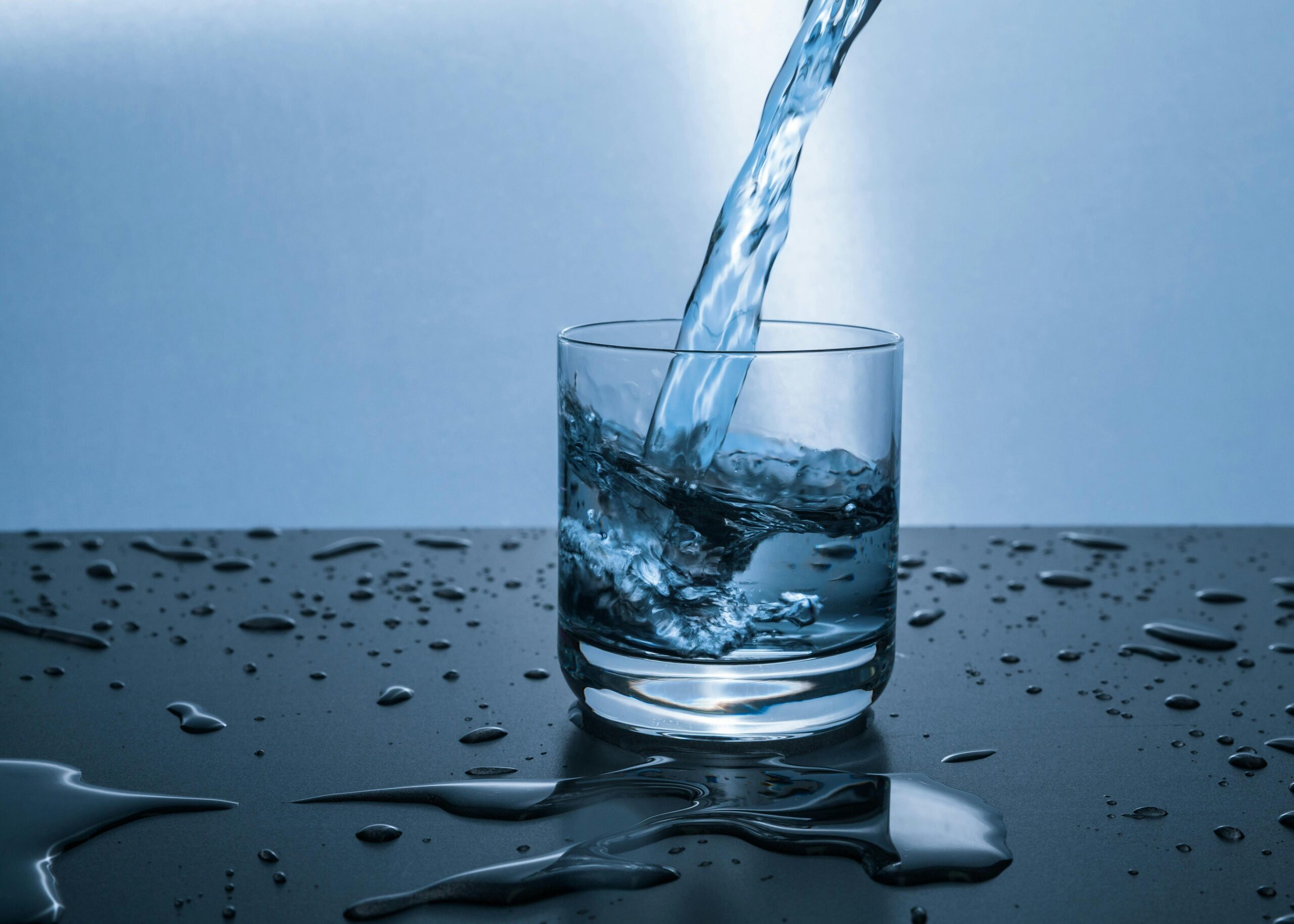 drinking water being poured into cup