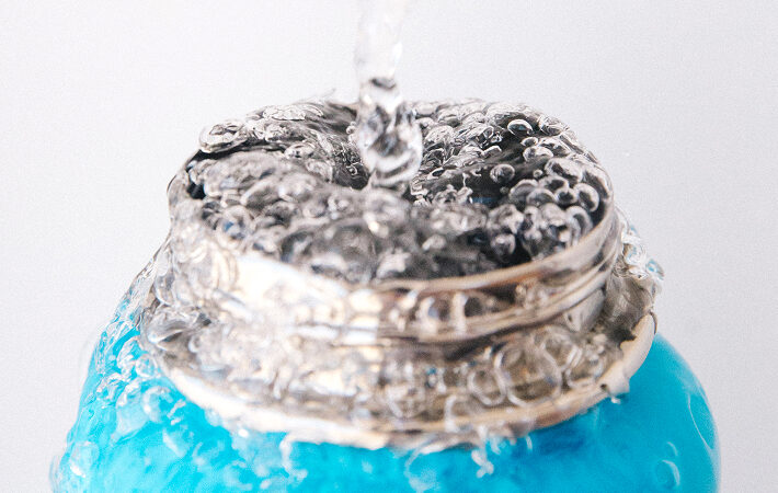 water bottle filling with flowater refill station