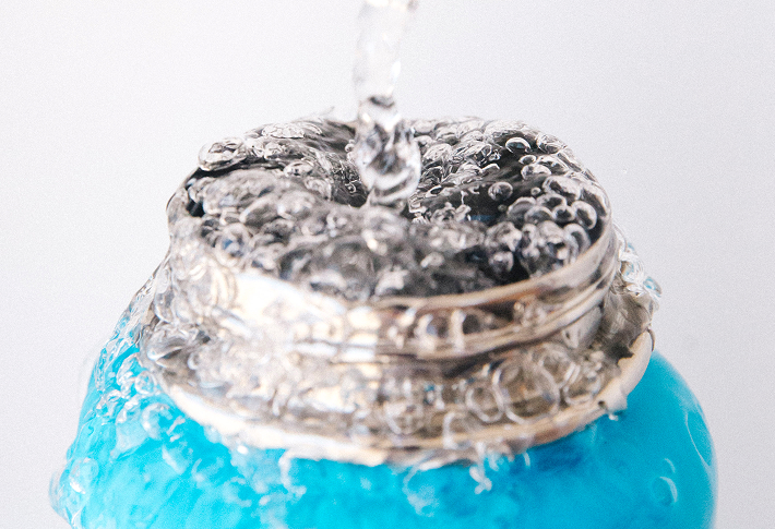 water bottle filling with flowater refill station