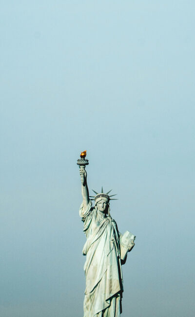 statue of liberty on gray sky background
