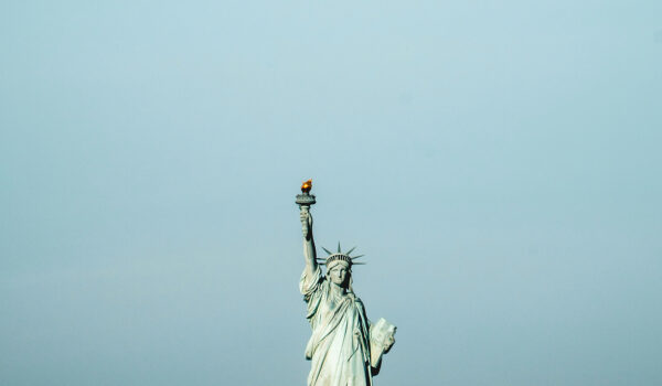 statue of liberty on gray sky background