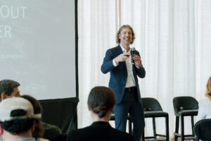 raz speaking at a conference