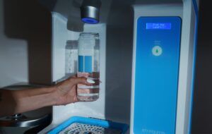 closeup of hand at flowater refill station