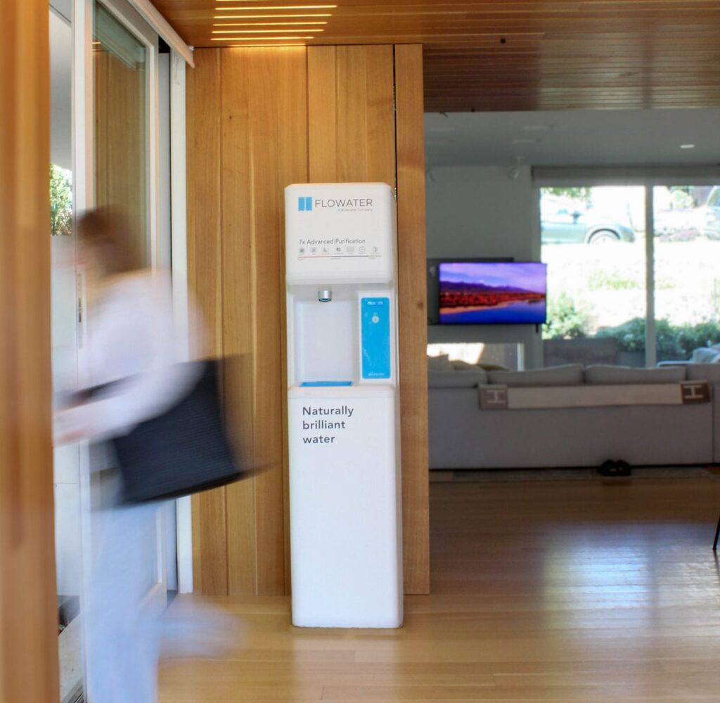 flowater classic in home with woman walking by