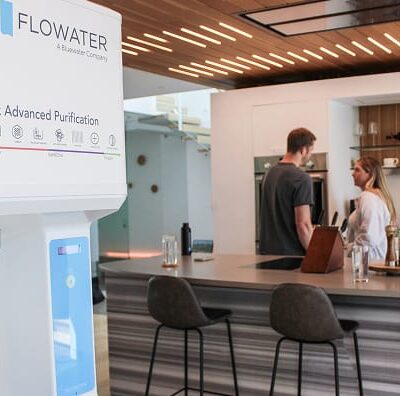 couple chatting near flowater refill station